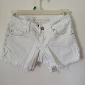 White distressed shorts
